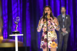 Michelle Tesoro accepts an award at the 2021 Creative Arts Emmys.