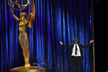 W. Kamau Bell presents during the 2021 Creative Arts Emmys.