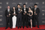 The main title team from The Last of Us backstage at the Creative Arts Emmy Awards