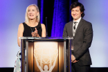 Engineering Awards committee chair Wendy Aylesworth and show host Josh Brener onstage at the 2015 Engineering Emmys at the Loews Hotel in Los Angeles, October 28, 2015.