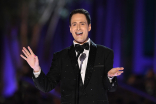 Randy Rainbow presents the award for Outstanding Music Composition for a Documentary Series or Special (Original Dramatic Score) at the 2022 Creative Arts Emmys.