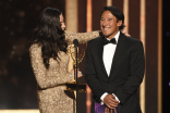 Elizabeth Chai Vasarhelyi and Jimmy Chin accept their award at the 2019 Creative Arts Emmys.