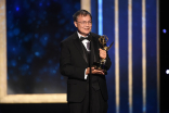 M. David Mullen accepts an award at the 2019 Creative Arts Emmy Awards.