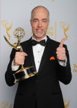 William Turro celebrates at the 2014 Primetime Creative Arts Emmys.