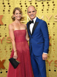 Karyn Kelly and Michael Kelly on the red carpet at the 71st Emmy Awards.