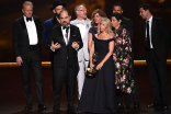 The team from Chernobyl accepts their award at the 71st Emmy Awards.