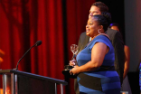 Karlese Mumfors-Campbell accepts an award at the 68th Los Angeles Area Emmys, July 23, 2016, at the Saban Media Center, North Hollywood, California. 