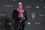 RuPaul Charles backstage with the award for Outstanding Reality Competition Series for RuPaul&#039;s Drag Race at the 75th Emmy Awards