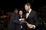 Arsenio Hall, Ken Jeong and Joel McHale backstage at the 75th Emmy Awards